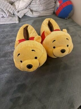Spencer's Yellow Winnie the Pooh Plush Slippers